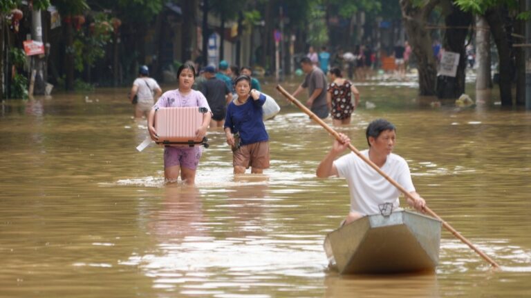 A tropical storm forces thousands to evacuate and kills 14 people in the Philippines.