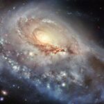 The One-Armed Wonder: Hubble Captures a Twisted Galaxy in Dazzling Detail