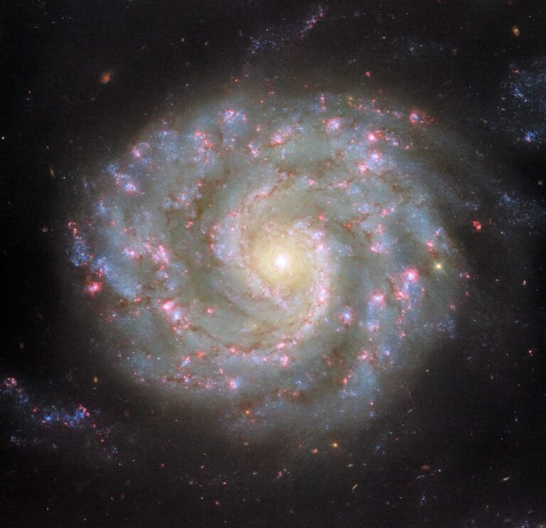 Hubble’s Hypnotic Spiral Galaxy Unwinds a 90-Million-Year Mystery
