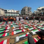 Dozens of Bodies Recovered from Gaza Rubble as Families Hold Mass Funeral