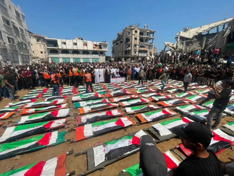Dozens of Bodies Recovered from Gaza Rubble as Families Hold Mass Funeral